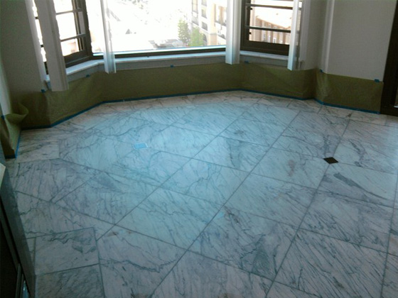 Before image of marble floor